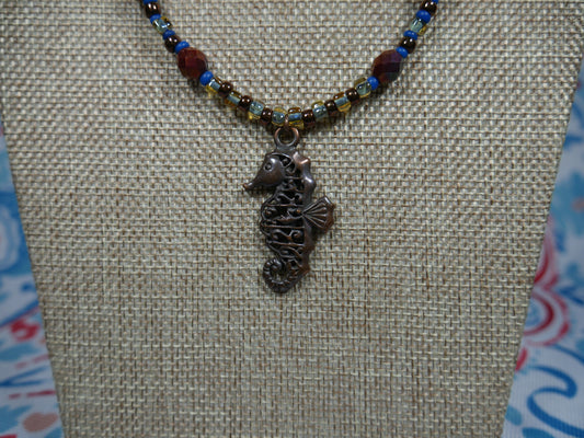 Bronze, Coppery, Brown and Blue Ocean-Themed Beaded Necklace with Tiger Eye and Seahorse Pendant