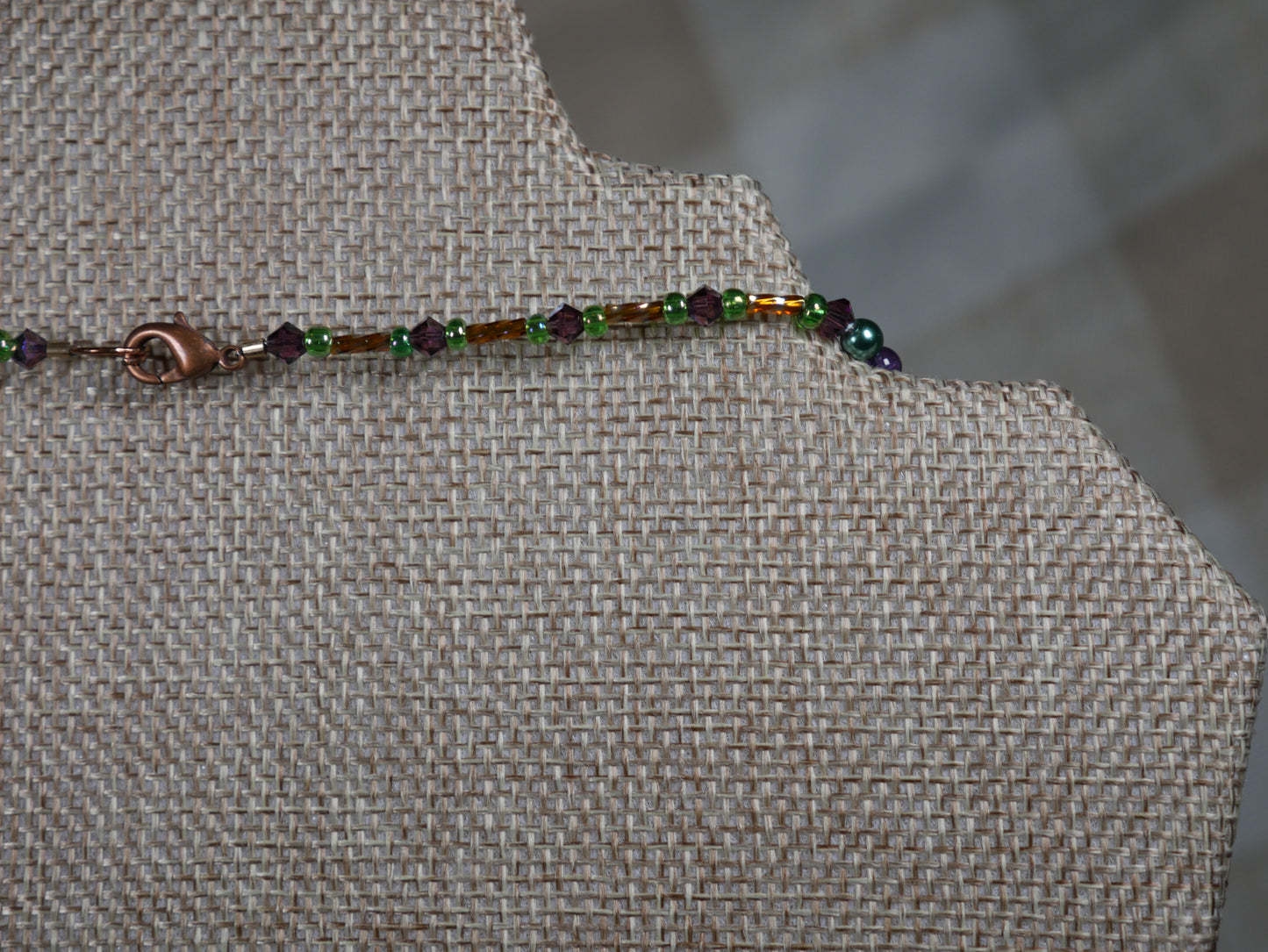 Purple, Green and Gold Beaded Necklace with Bicone Crystals and Crystal Encrusted Accent Bead