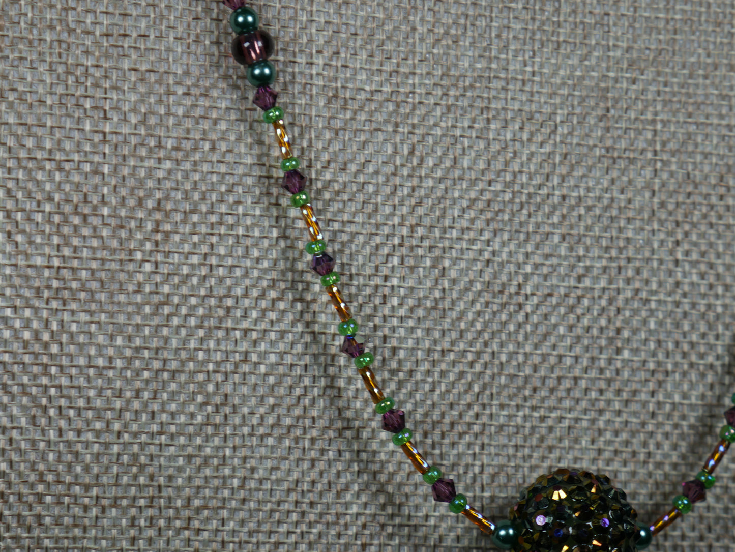 Purple, Green and Gold Beaded Necklace with Bicone Crystals and Crystal Encrusted Accent Bead