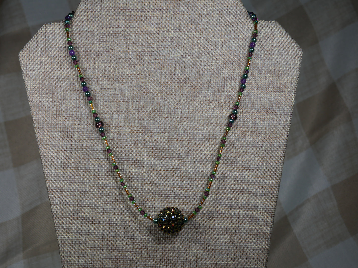 Purple, Green and Gold Beaded Necklace with Bicone Crystals and Crystal Encrusted Accent Bead