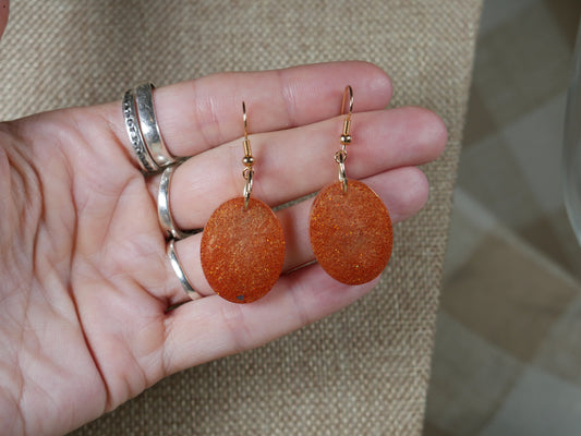 Coppery Sparkly Oval Resin Earrings